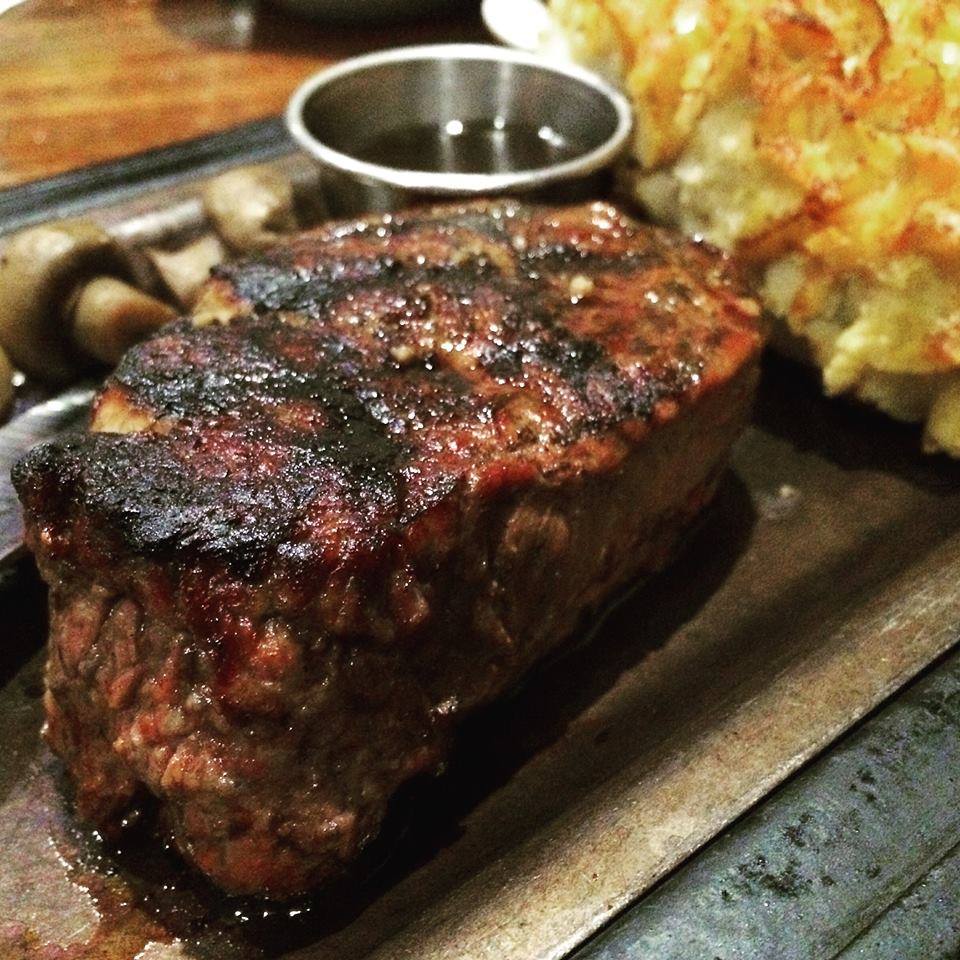 strip steak with au jus and twice baked potato